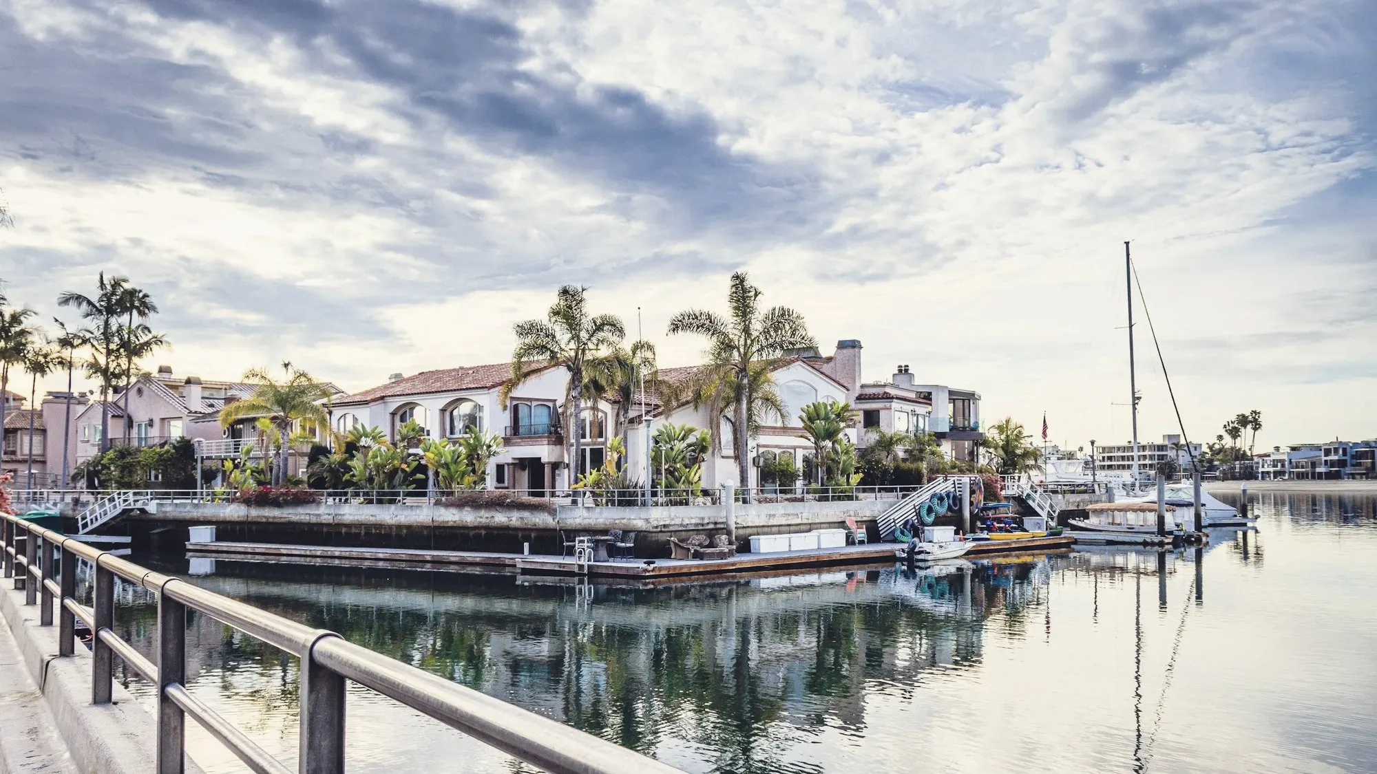 Long Beach marina with boats and palm trees
