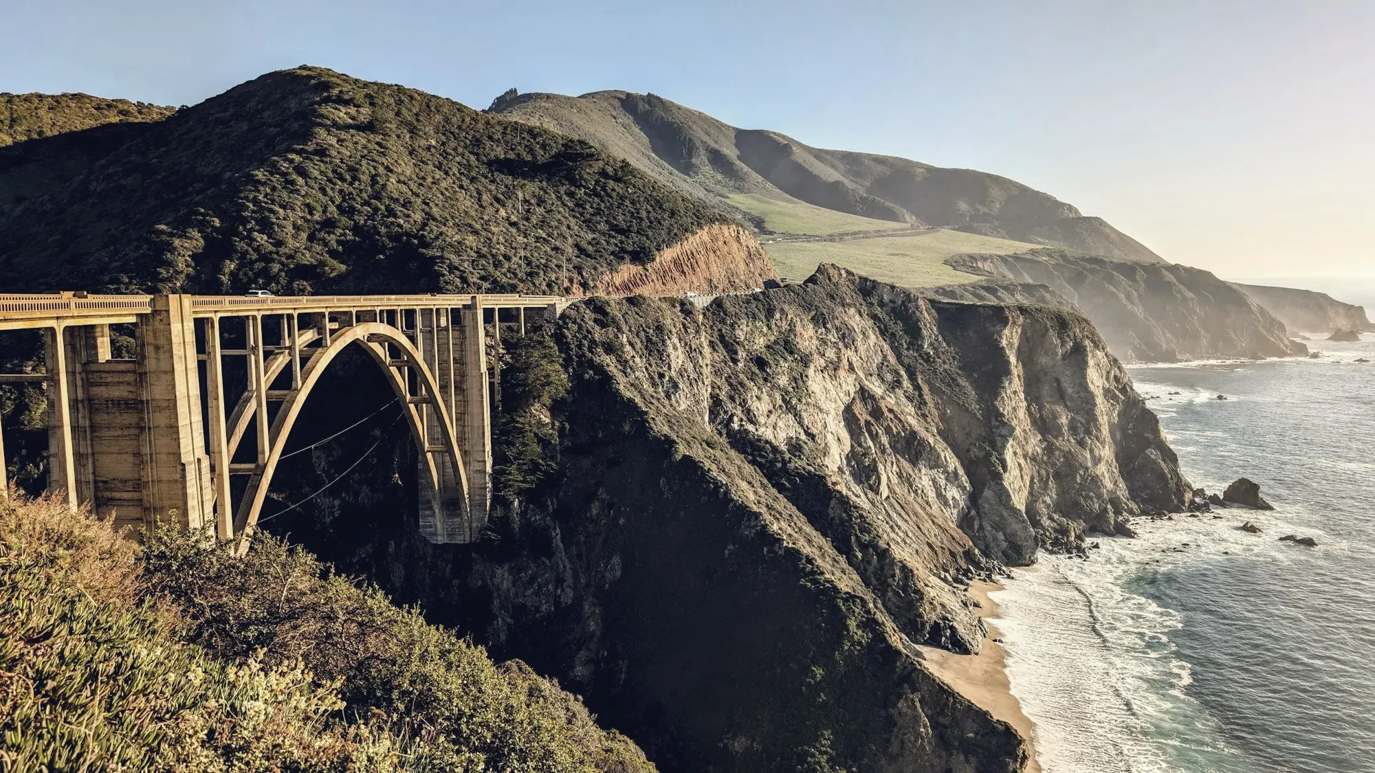 Bixby Creek Bridge spanning a canyon along the rugged Big Sur coastline.